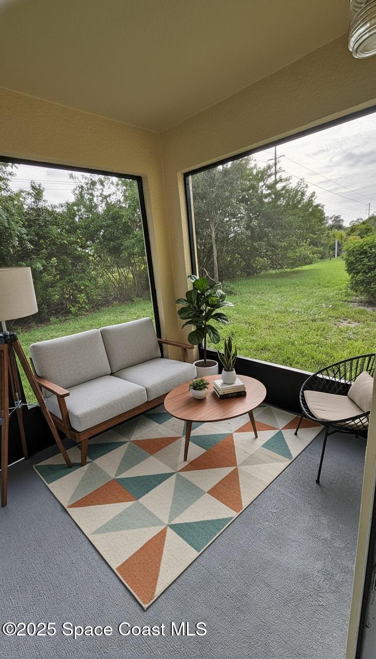 1877 Attilburgh Boulevard West Melbourne, FL 32904 - Photo 19 of 19 a outdoor living space with furniture and garden view