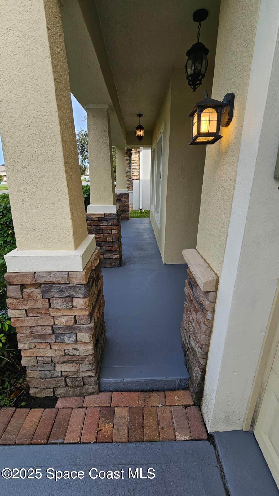 1877 Attilburgh Boulevard West Melbourne, FL 32904 - Photo 2 of 19 a view of entryway and hall