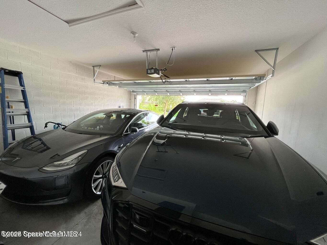 1877 Attilburgh Boulevard West Melbourne, FL 32904 - Photo 4 of 19 a view of car and car