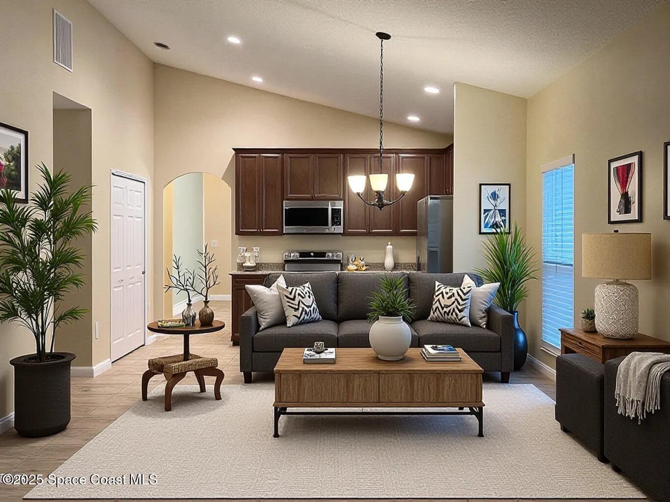 1877 Attilburgh Boulevard West Melbourne, FL 32904 - Photo 10 of 19 a living room with furniture and a flat screen tv