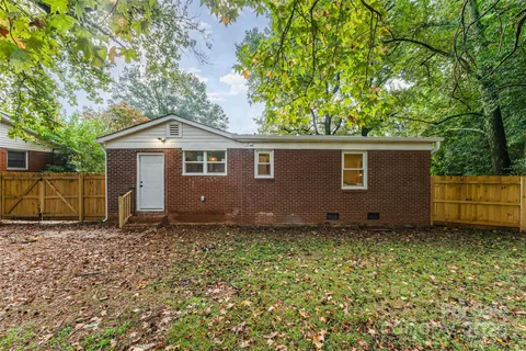 a house with a tree in the background