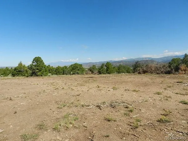 a view of beach and mountain