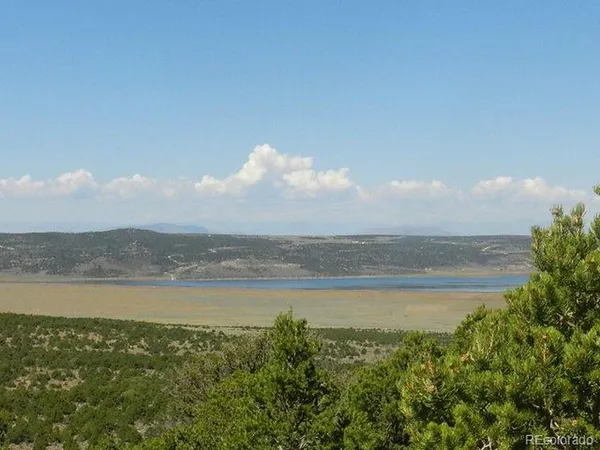 a view of outside space with a lake view