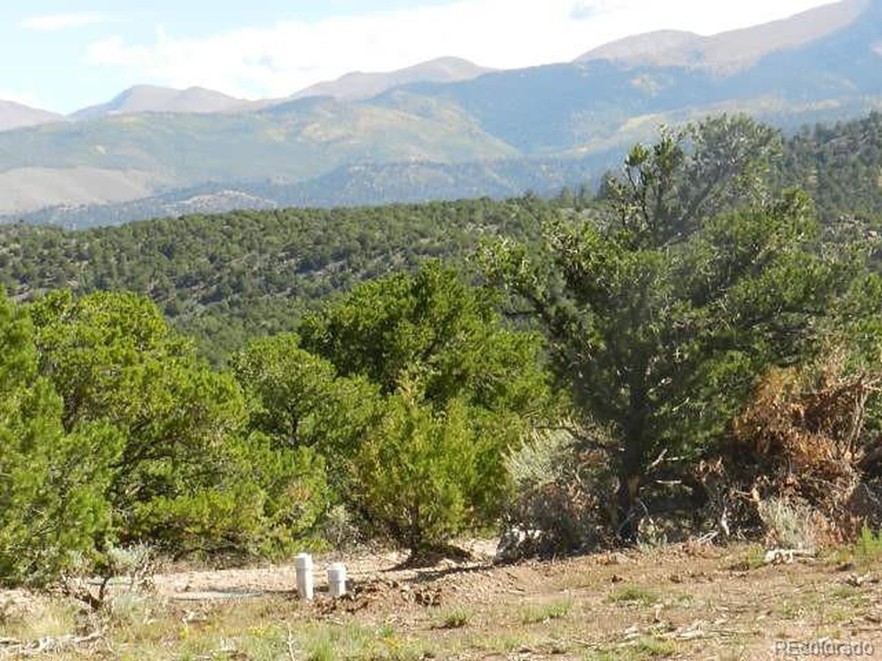 8 Mountain Ridge Lane San Luis, CO 81152 - Photo 8 of 28 a view of a yard with a mountain