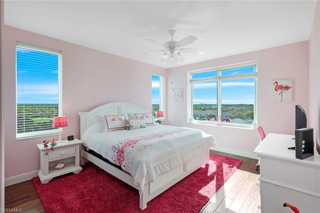 275 Indies Way, Unit 706 Naples, FL 34110 - Photo 25 of 50 a bedroom with a bed and a window