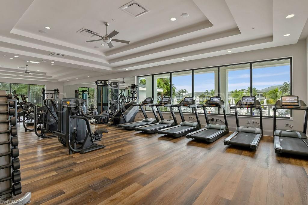 275 Indies Way, Unit 706 Naples, FL 34110 - Photo 46 of 50 a view of a room with gym equipment