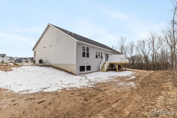 $549,900 | 6607 Timber Crst Drive Northeast, Unit 56, Rockford, MI 49341