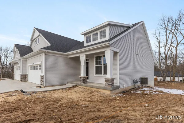 $549,900 | 6607 Timber Crst Drive Northeast, Unit 56, Rockford, MI 49341