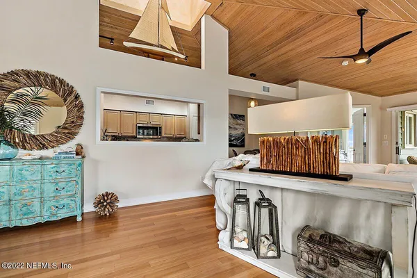 a living room with furniture fireplace and a fireplace