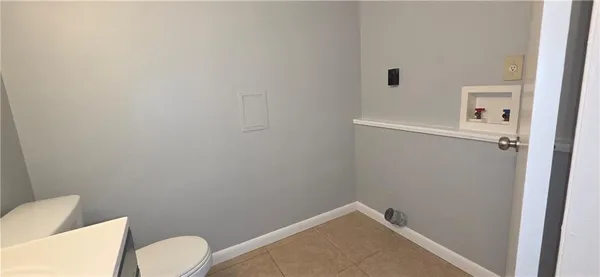 a bathroom with a toilet