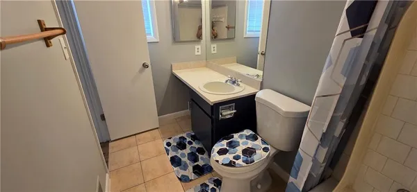 a bathroom with a sink and a toilet