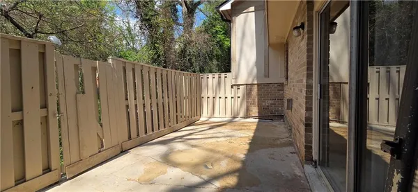 a view of a wooden fence of the house