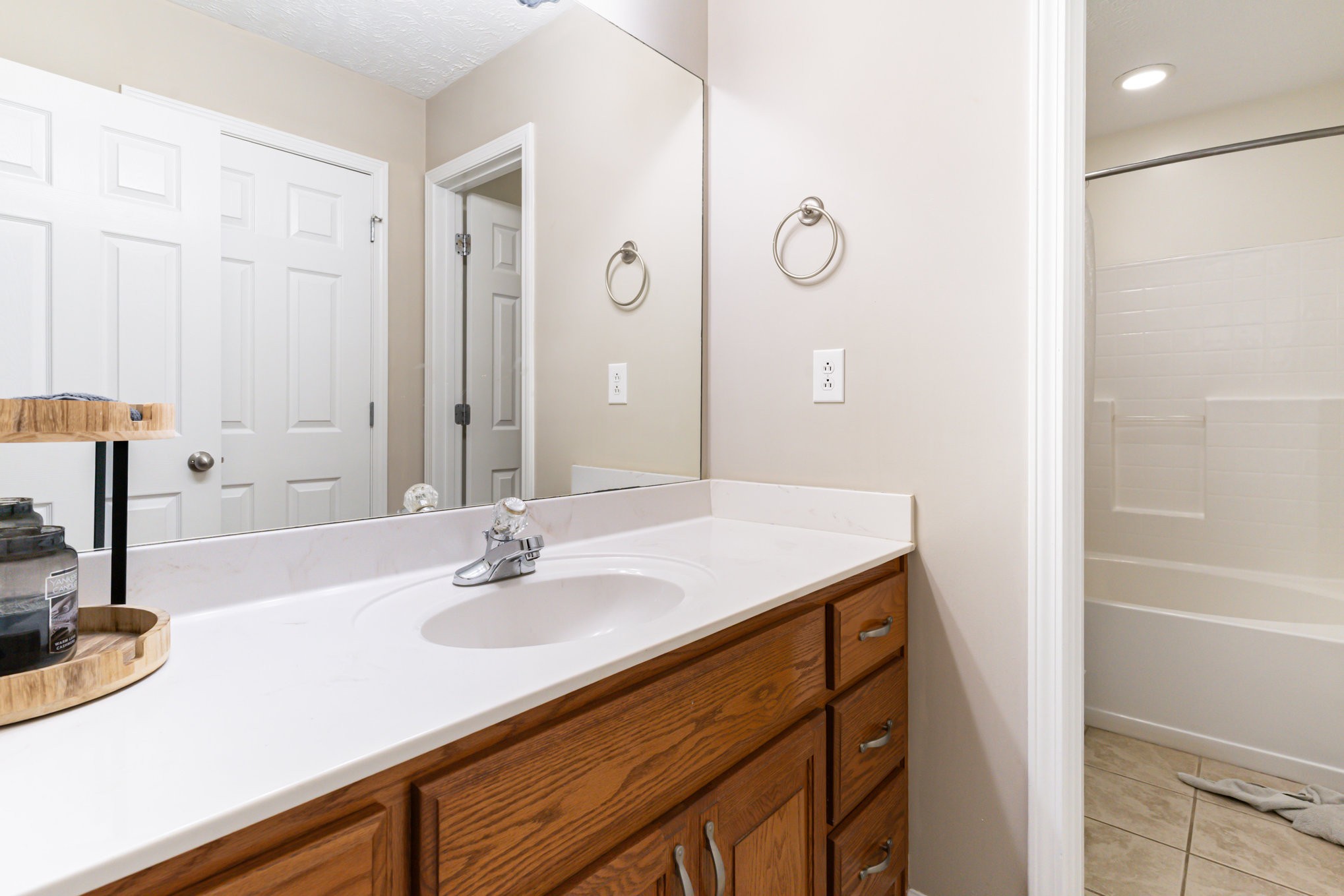 3075 Bowker Road Charlotte, TN 37036 - Photo 14 of 28 a bathroom with a sink and a mirror