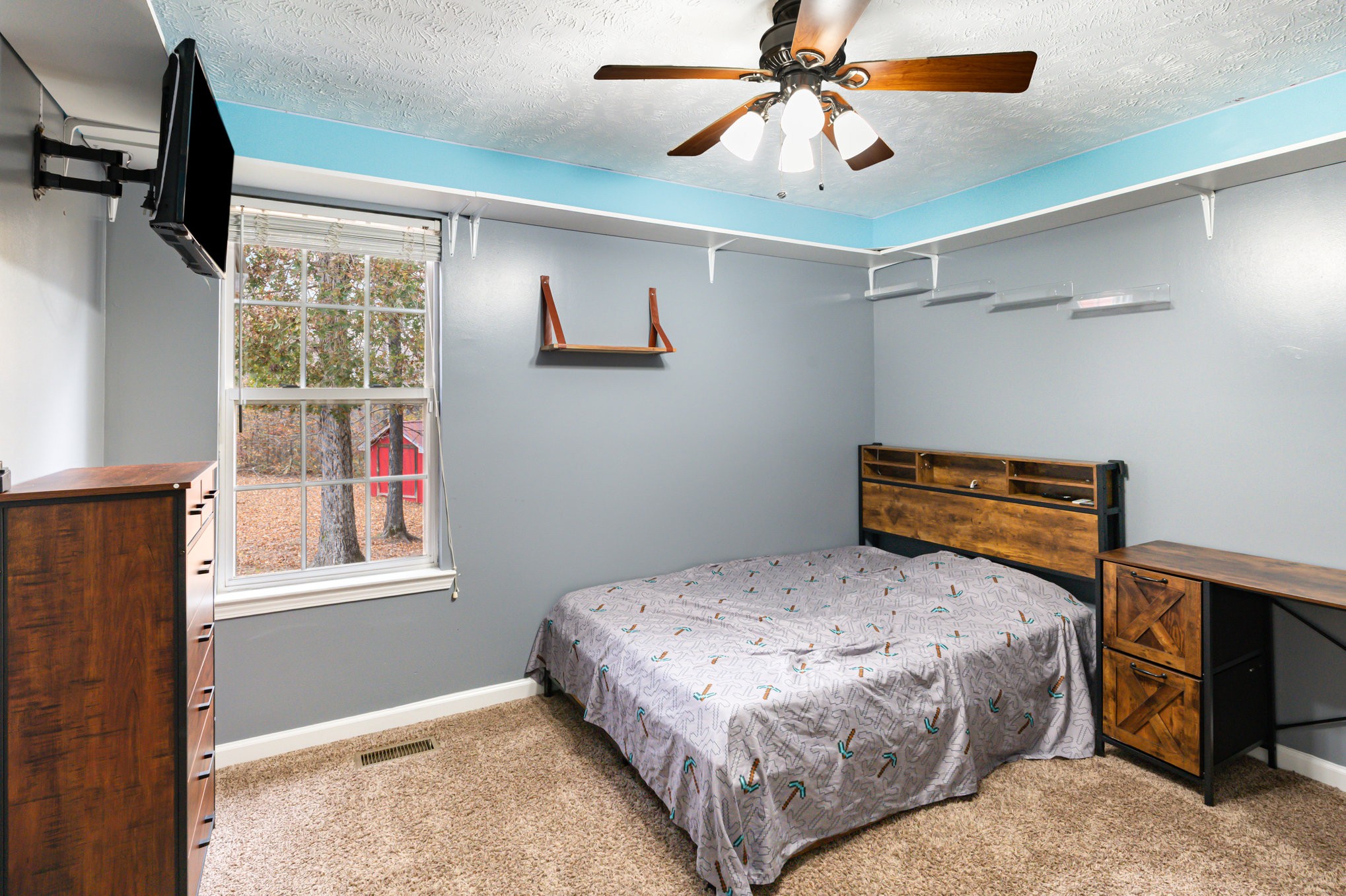 3075 Bowker Road Charlotte, TN 37036 - Photo 17 of 28 a bedroom with a bed and a window