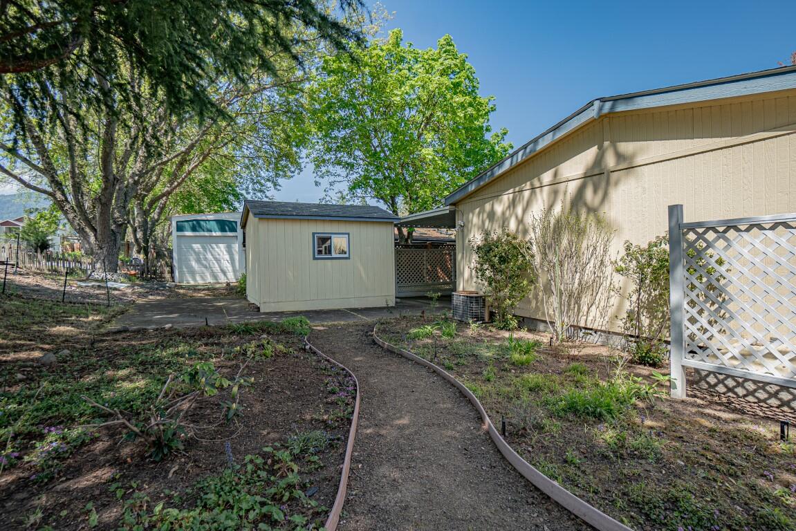 215 Tolman Creek Road, Unit 38 Ashland, OR 97520 - Photo 30 of 32 Backyard and Shed