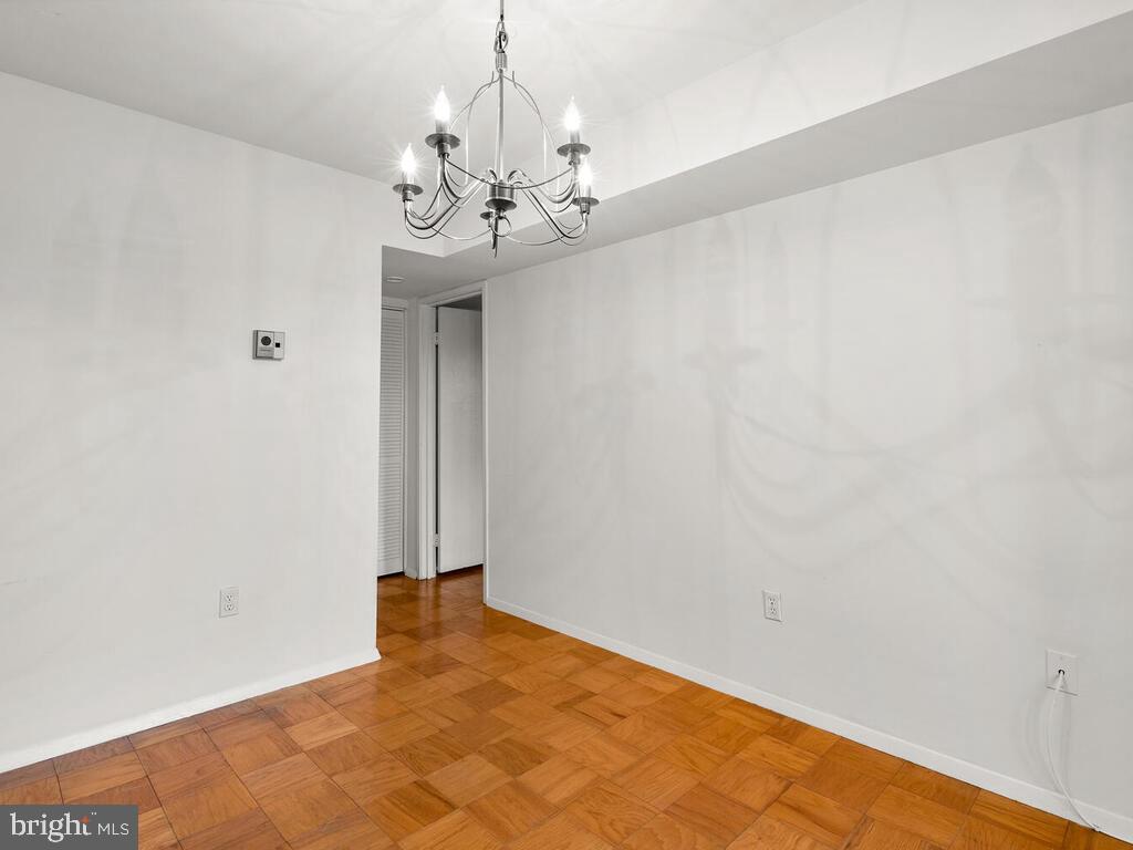2109 Walsh View Terrace, Unit 12203 Silver Spring, MD 20902 - Photo 20 of 23 Dining Room to BRs