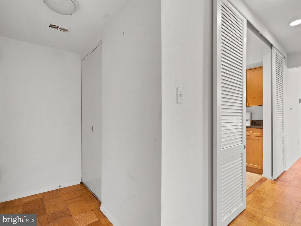 2109 Walsh View Terrace, Unit 12203 Silver Spring, MD 20902 - Photo 5 of 23 Entryway with Hall Closet