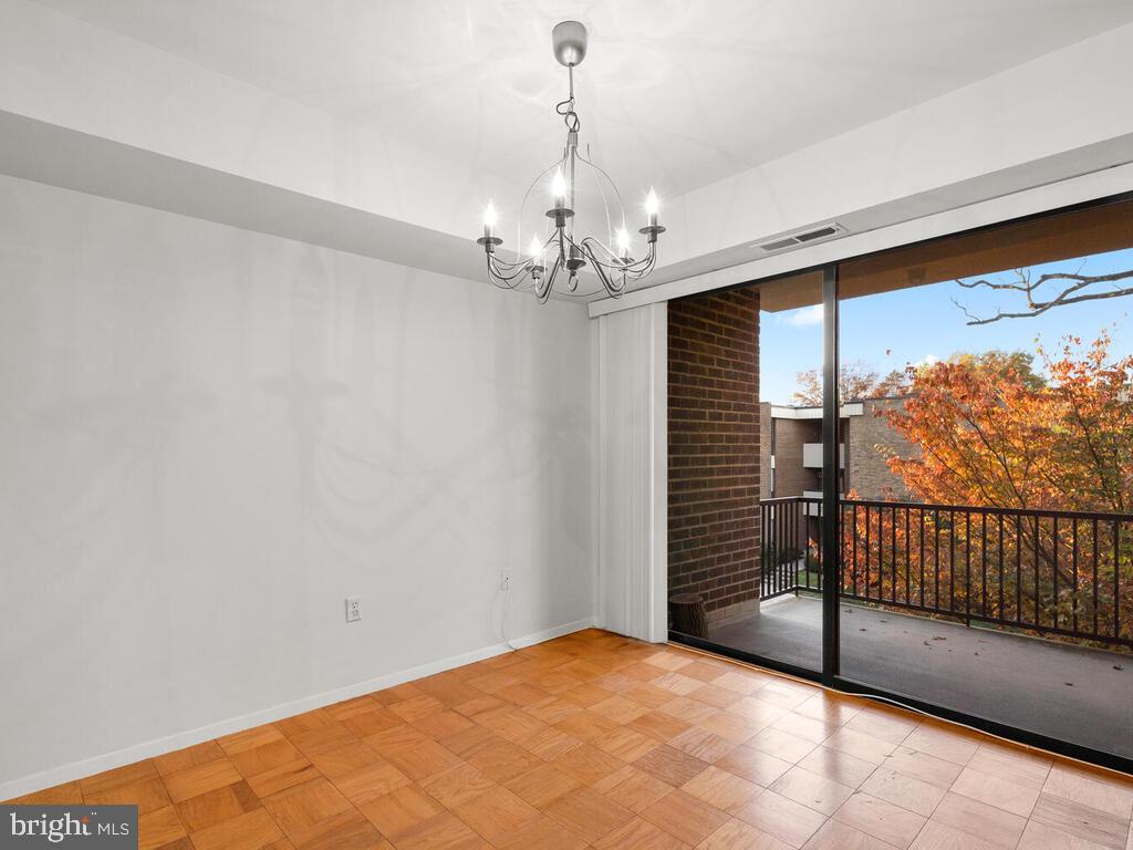 2109 Walsh View Terrace, Unit 12203 Silver Spring, MD 20902 - Photo 9 of 23 Dining Room - w/o to Balcony