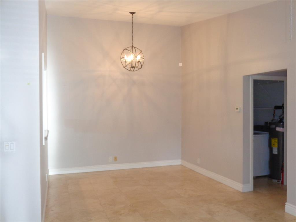 5048 Heatherhill Lane, Unit 1204 Boca Raton, FL 33486 - Photo 12 of 31 a view of empty room with wooden floor
