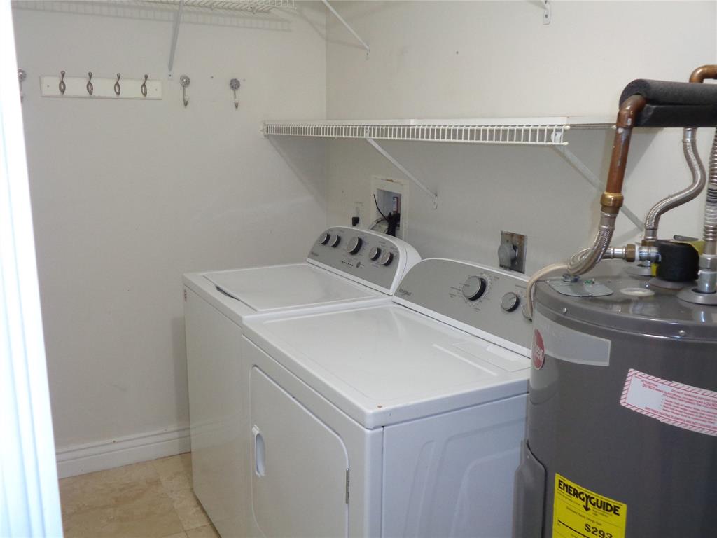 5048 Heatherhill Lane, Unit 1204 Boca Raton, FL 33486 - Photo 13 of 31 a utility room with dryer and washer