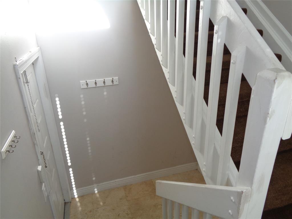 5048 Heatherhill Lane, Unit 1204 Boca Raton, FL 33486 - Photo 6 of 31 a view of an entryway with staircase