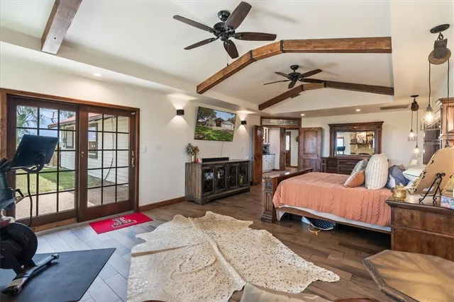 a bed room with a bed and a window