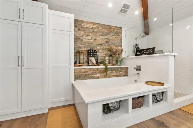 a kitchen with a stove and a refrigerator