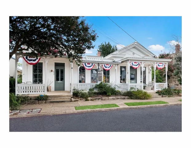 a house view with a garden space
