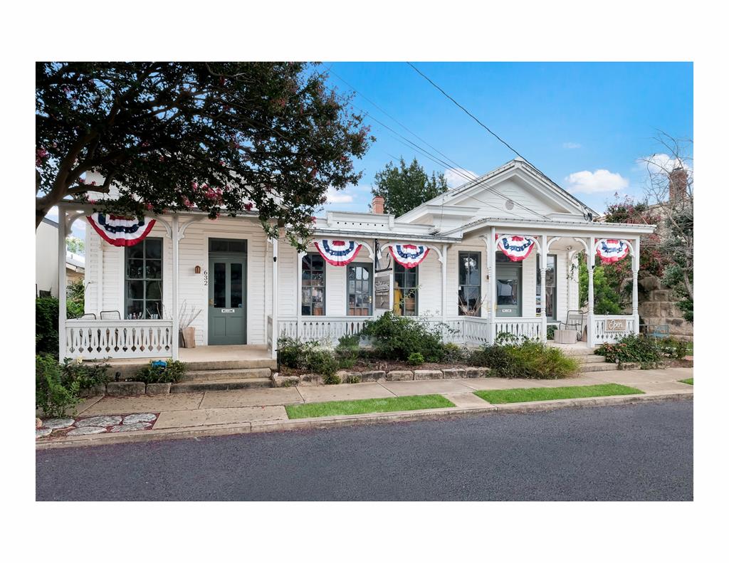 a house view with a garden space