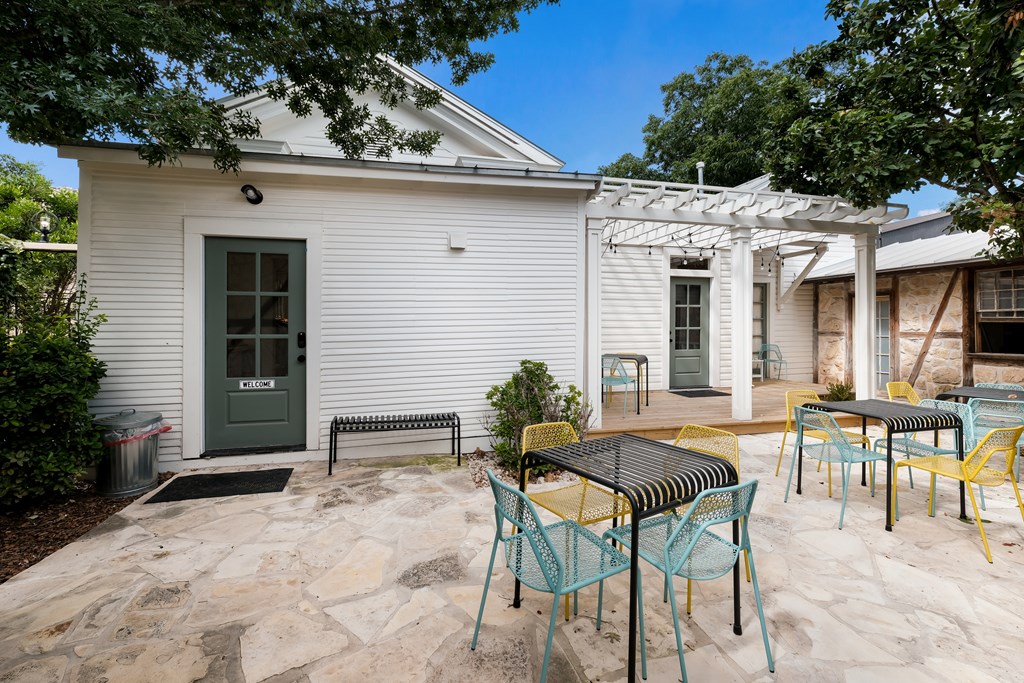 632-636 High Street Comfort, TX 78013 - Photo 18 of 56 a view of a patio with table and chairs and potted plants