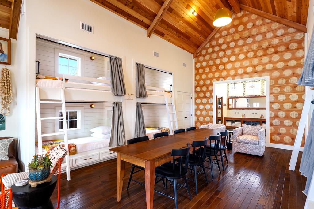 632-636 High Street Comfort, TX 78013 - Photo 29 of 56 a dining room with furniture and wooden floor