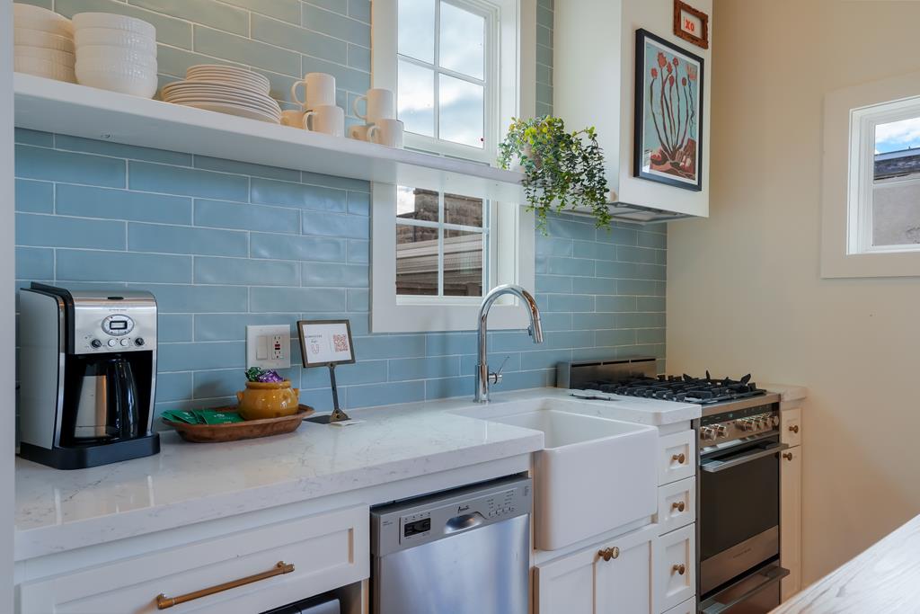632-636 High Street Comfort, TX 78013 - Photo 32 of 56 a kitchen with a sink stove and wooden floor