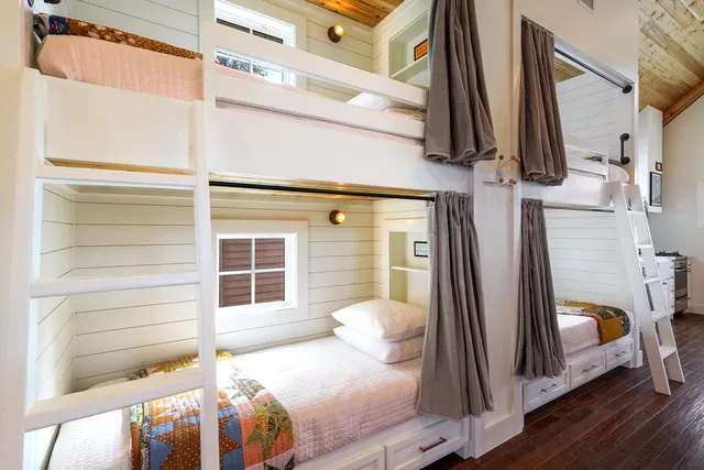 a room with furniture and wooden floor