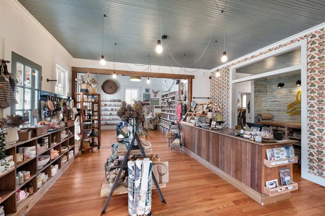 a view of a dining room and wooden floor