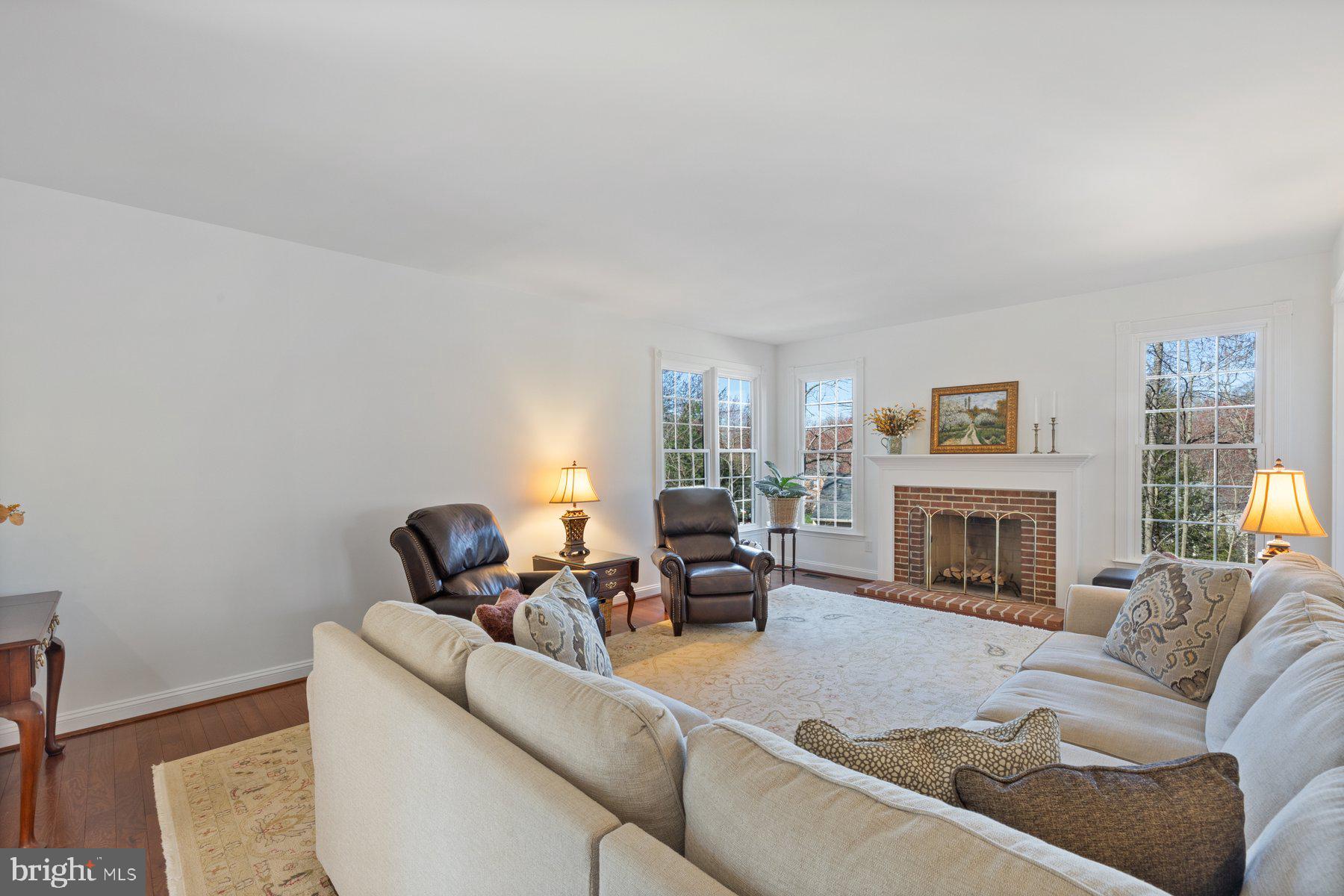 20623 Cutwater Place Sterling, VA 20165 - Photo 15 of 59 a living room with furniture or fireplace and a flat screen tv