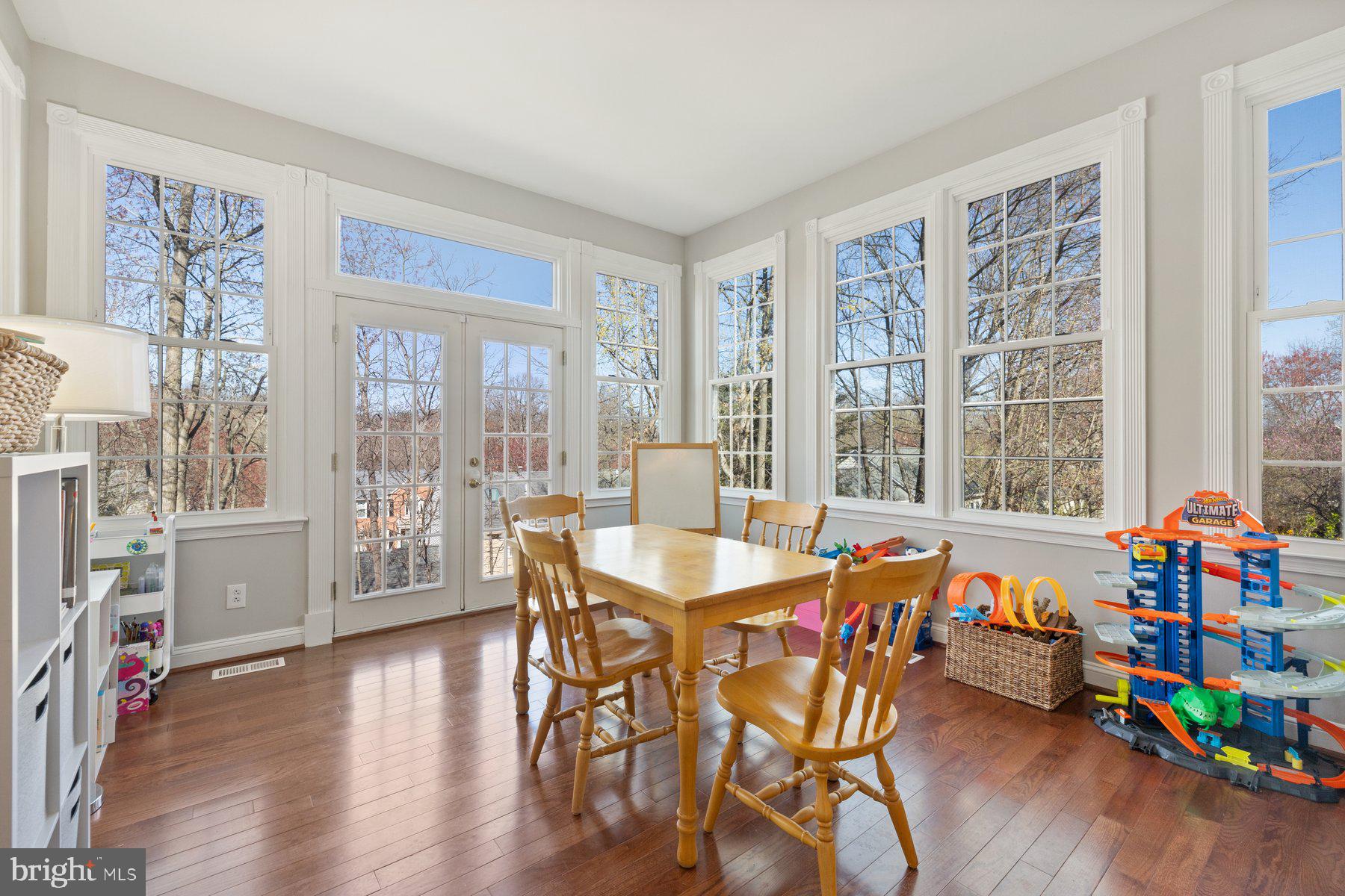 20623 Cutwater Place Sterling, VA 20165 - Photo 17 of 59 a dining room with furniture water view and large windows
