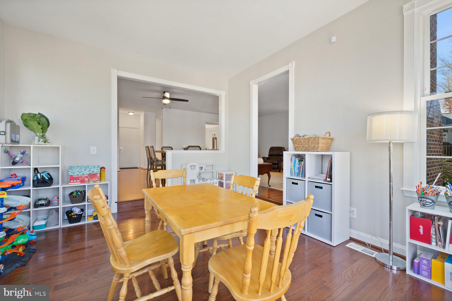 20623 Cutwater Place Sterling, VA 20165 - Photo 18 of 59 a dining room with furniture and wooden floor
