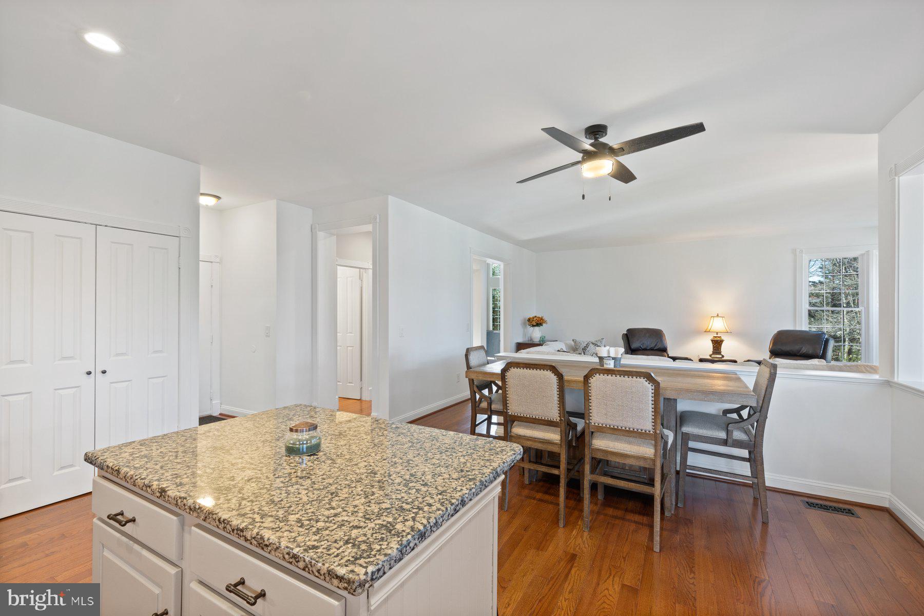 20623 Cutwater Place Sterling, VA 20165 - Photo 20 of 59 a view of a dining room with furniture