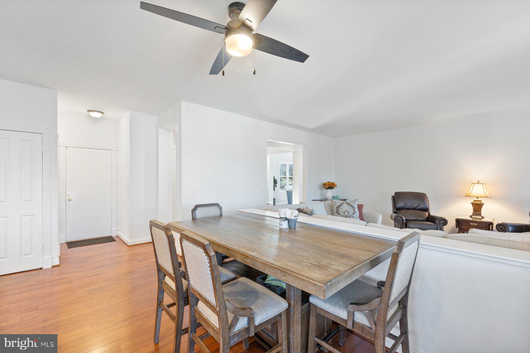 20623 Cutwater Place Sterling, VA 20165 - Photo 23 of 59 a dining room with furniture and window