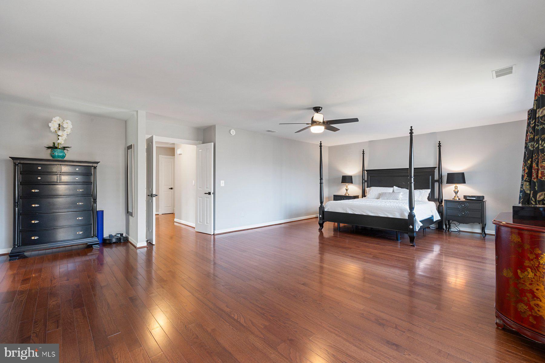 20623 Cutwater Place Sterling, VA 20165 - Photo 28 of 59 a bedroom with furniture and a wooden floor