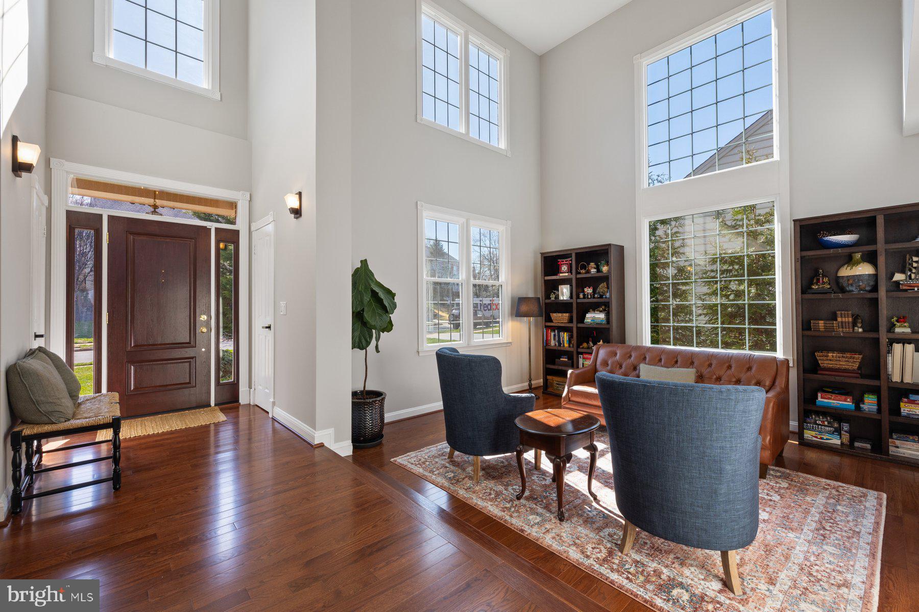 20623 Cutwater Place Sterling, VA 20165 - Photo 3 of 59 a living room with furniture and wooden floor