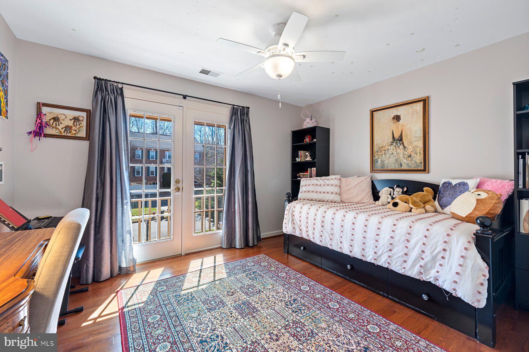 20623 Cutwater Place Sterling, VA 20165 - Photo 32 of 59 a bedroom with bed couch and window