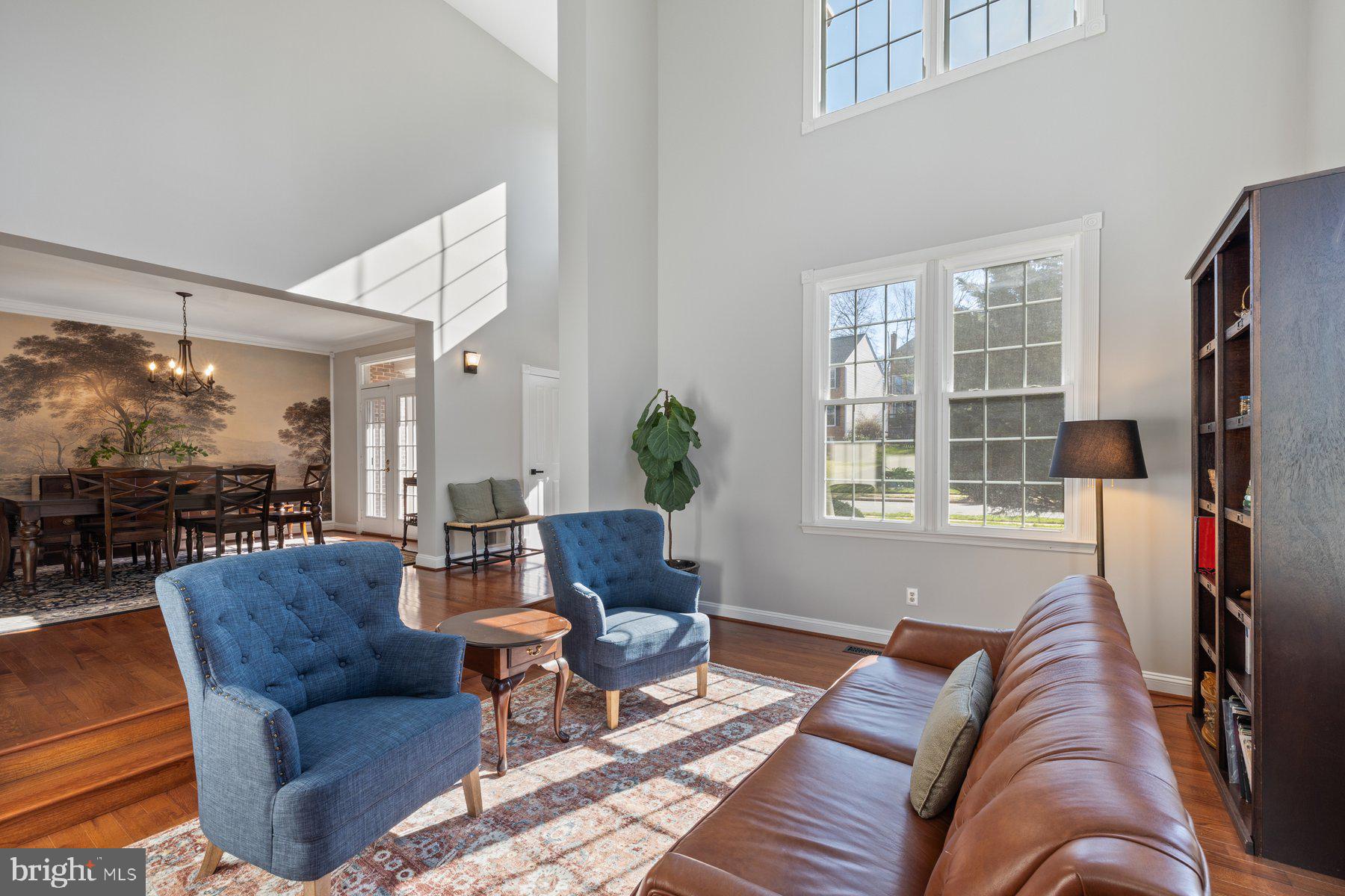 20623 Cutwater Place Sterling, VA 20165 - Photo 5 of 59 a living room with furniture and a flat screen tv