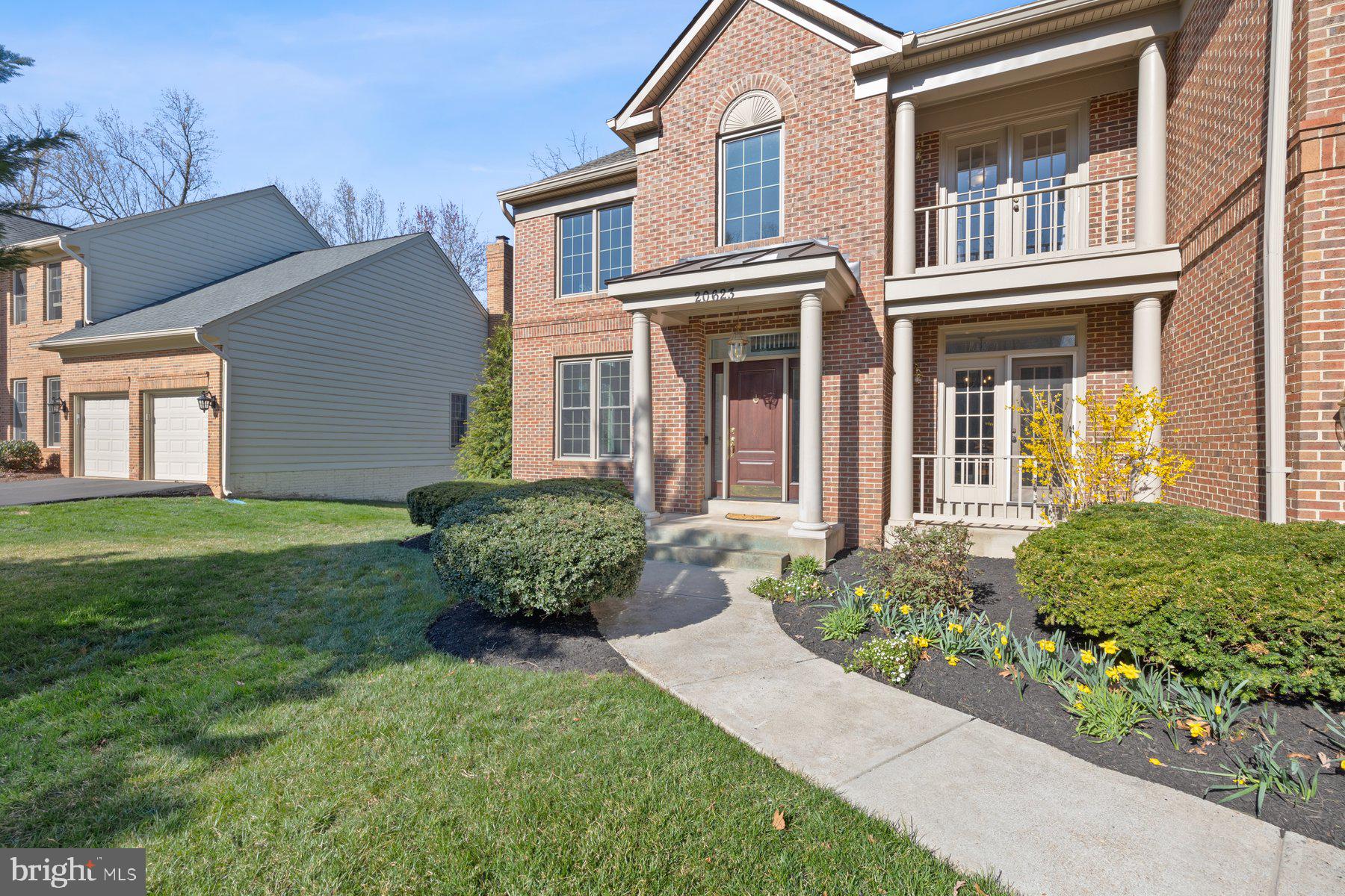 20623 Cutwater Place Sterling, VA 20165 - Photo 58 of 59 front view of a house with a yard