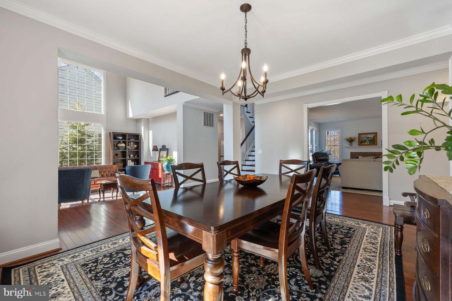 20623 Cutwater Place Sterling, VA 20165 - Photo 7 of 59 a view of a dining room with furniture and wooden floor