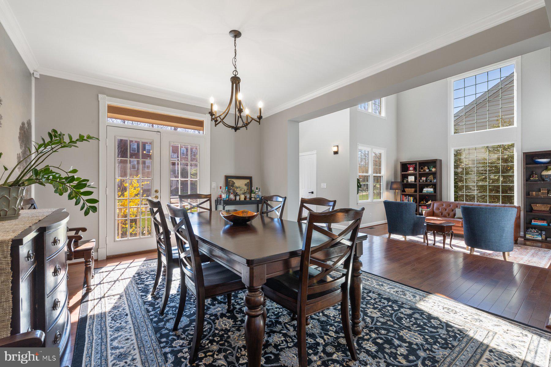 20623 Cutwater Place Sterling, VA 20165 - Photo 8 of 59 a view of a dining room with furniture window and wooden floor