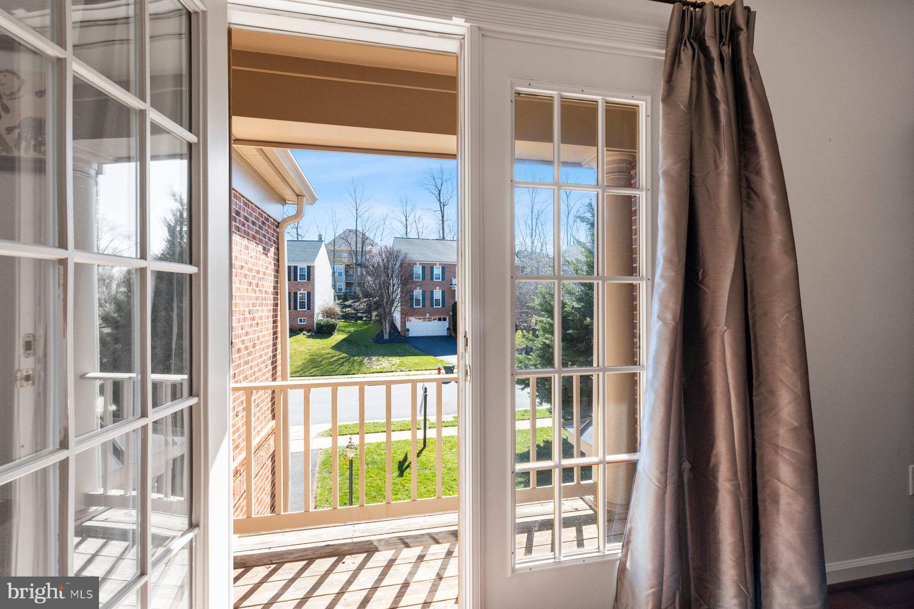 20623 Cutwater Place Sterling, VA 20165 - Photo 10 of 59 a view of a balcony from a living room