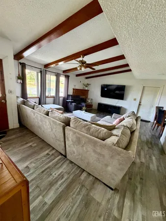 a living room with furniture and a table