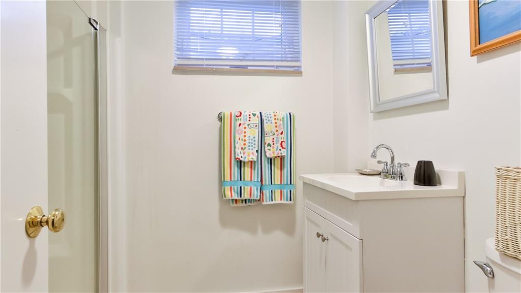 172 Mayfair Drive Pittsburgh, PA 15228 - Photo 21 of 25 a bathroom with a sink and a mirror