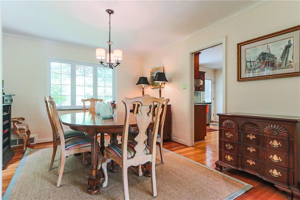 172 Mayfair Drive Pittsburgh, PA 15228 - Photo 6 of 25 a view of a dining room with furniture window and wooden floor